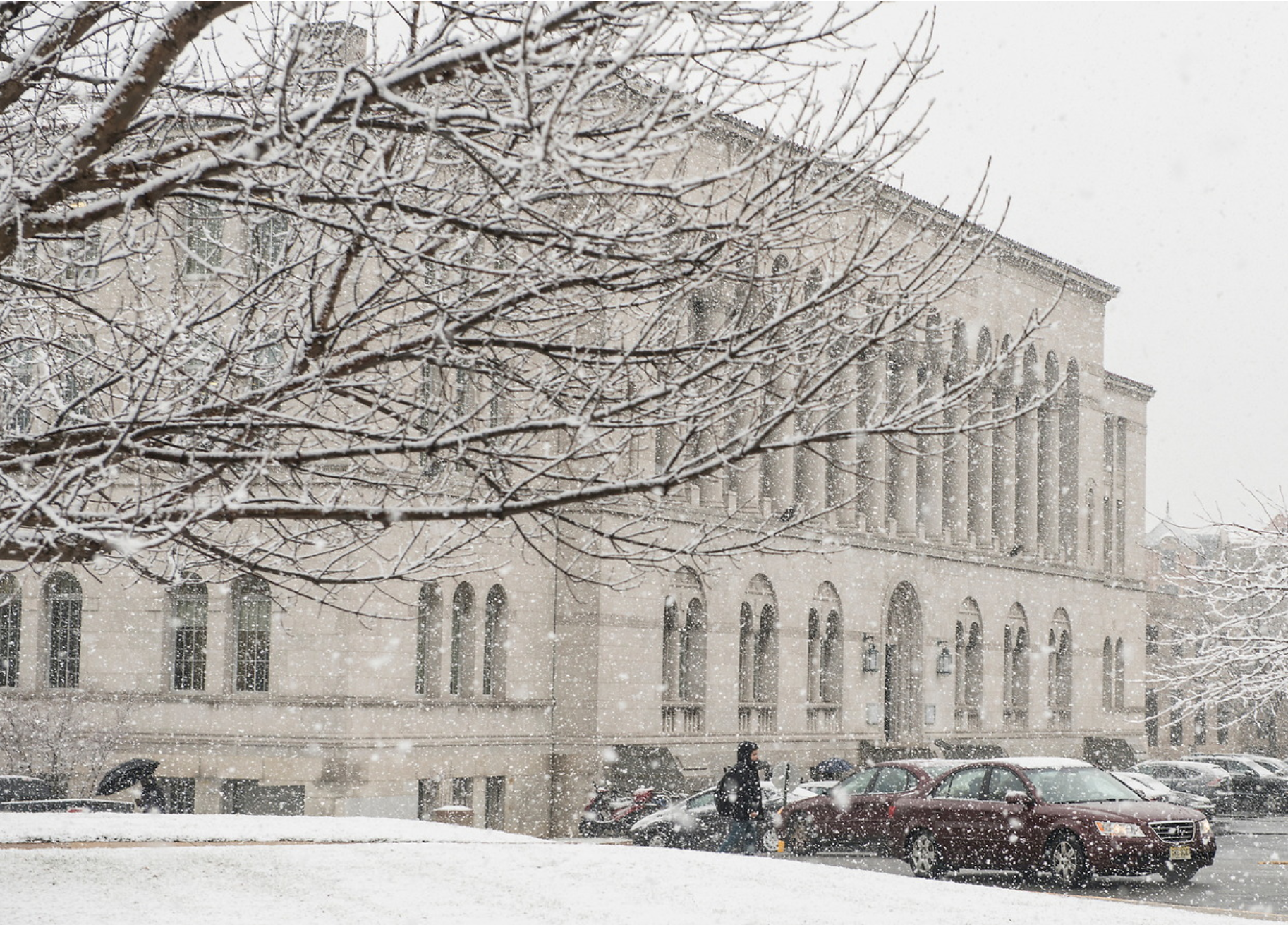 image of Mullen library in a snowstorm